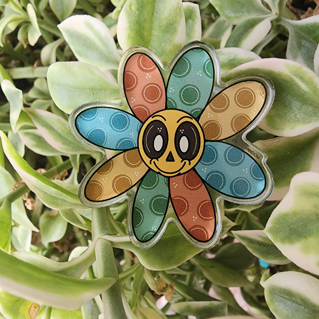 Smiley flower pin