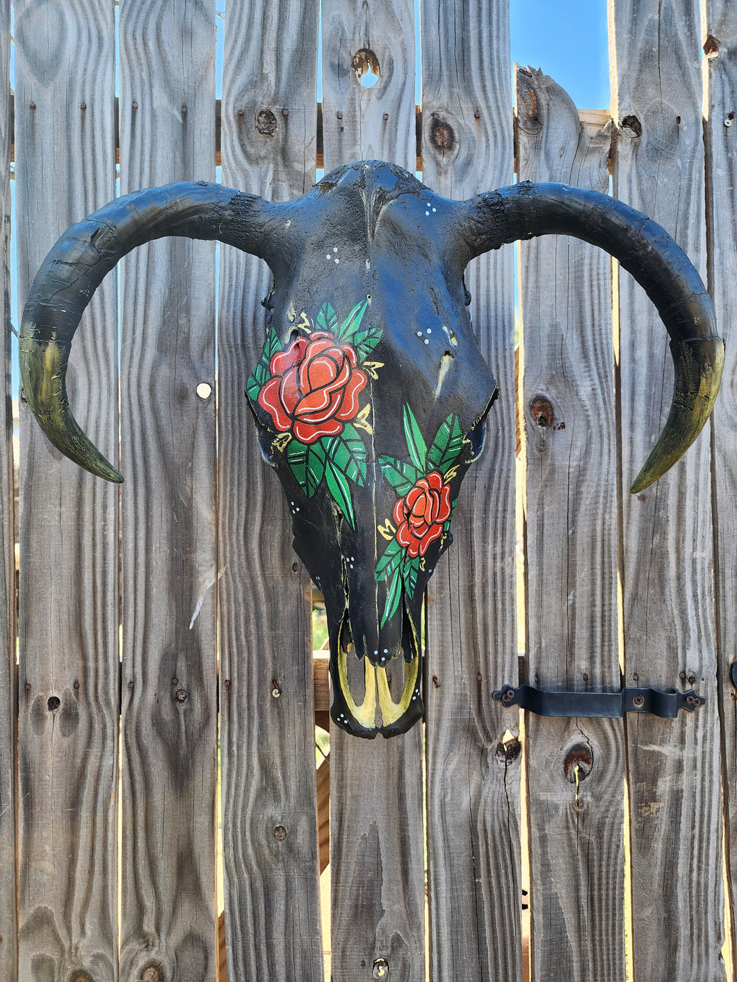 Real curved horned rose cow skull